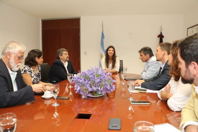 Romero con autoridades de la Cámara de Comercio