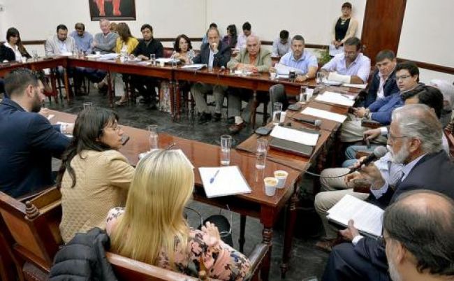 Plenario con comerciantes y miembros del ejecutivo