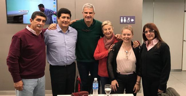 Los expositores con el diputado Andrés Zottos